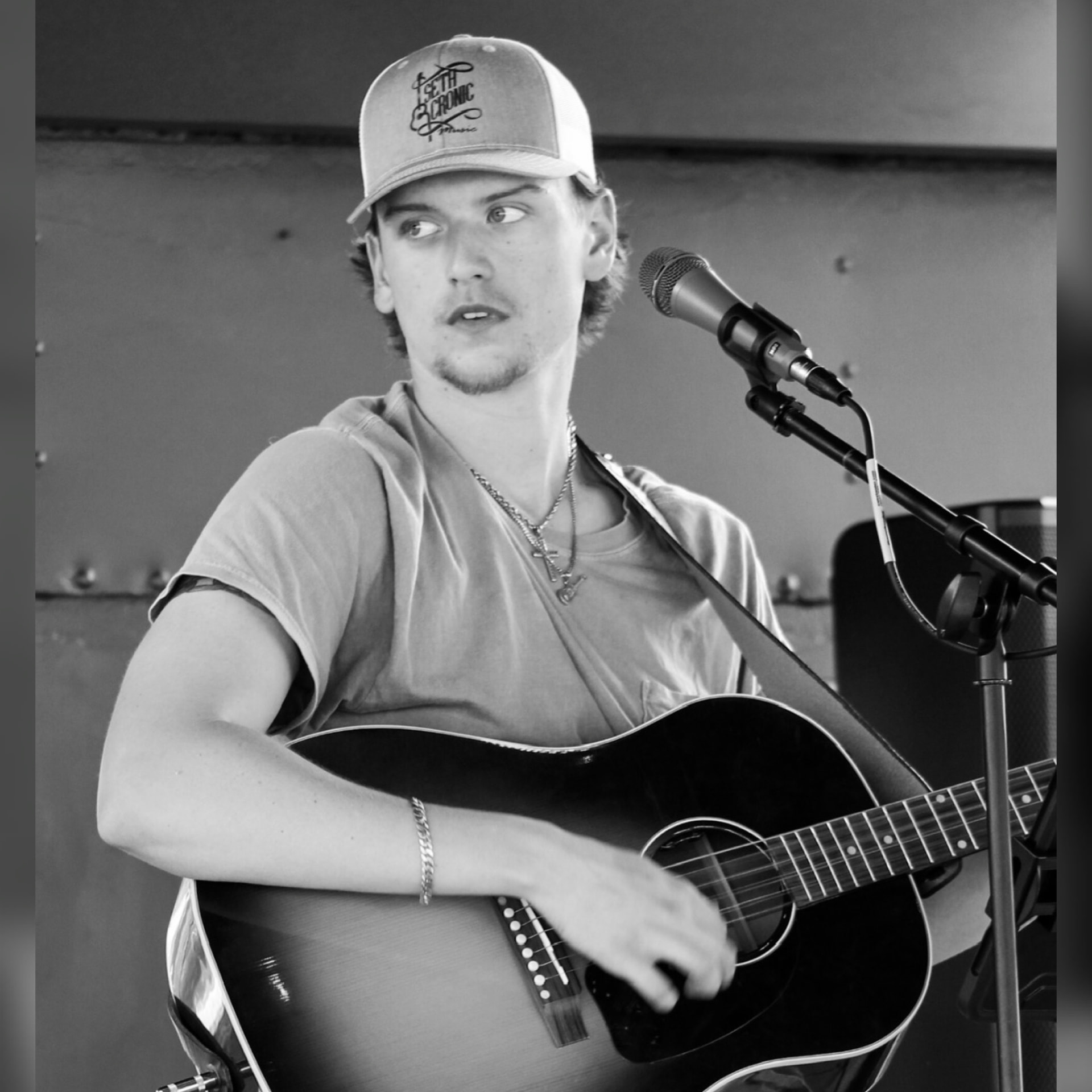 Seth Cronic performing live wearing a Seth Cronic Music cap